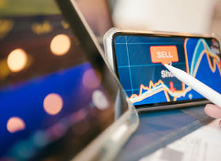 Trader evaluating Bitcoin, Ethereum, and forex options across multiple markets